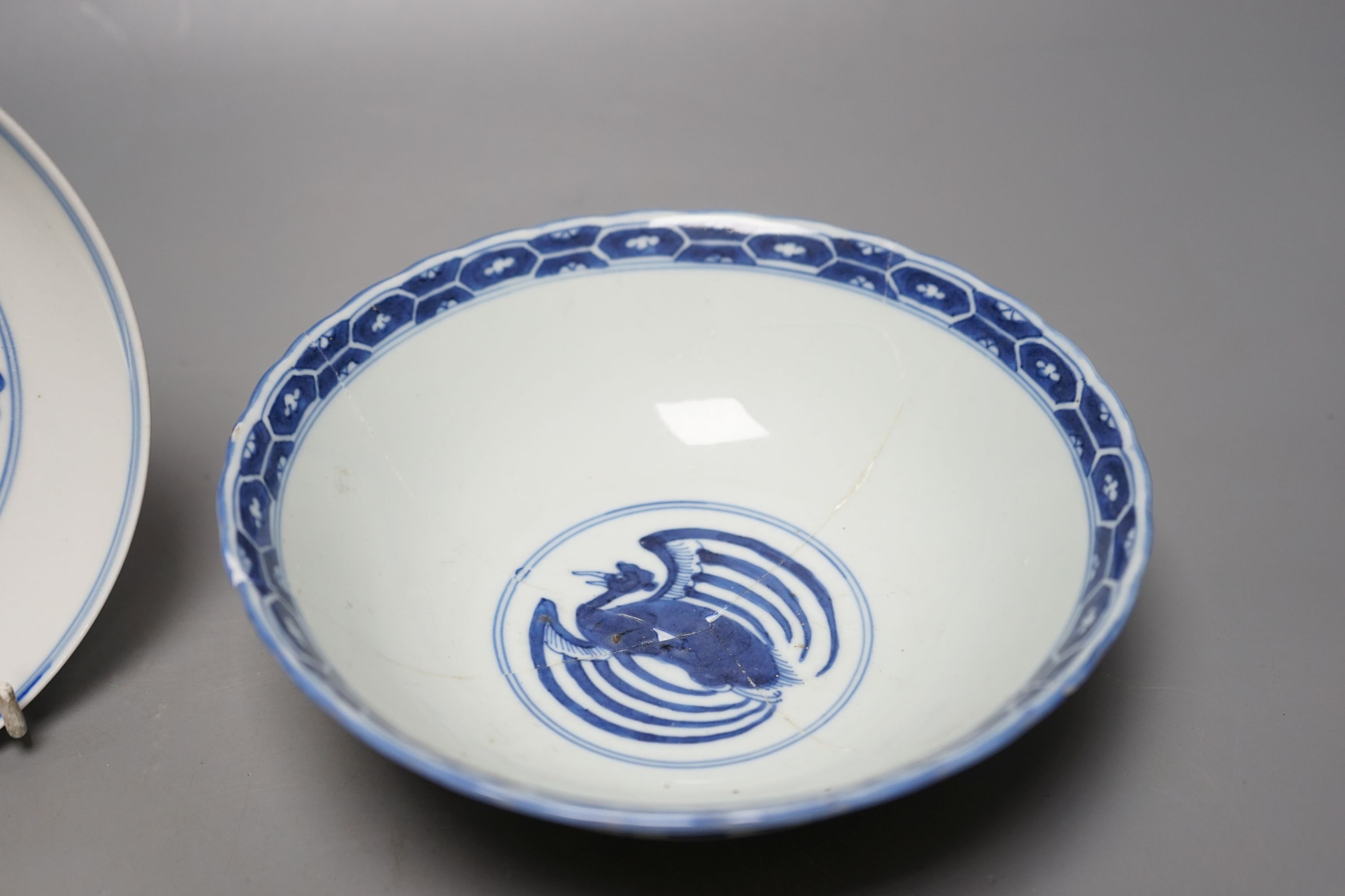 A Chinese blue and white landscape bowl, a/f and a Chinese blue and white 'dragon' dish, 18cm and 16.5cm